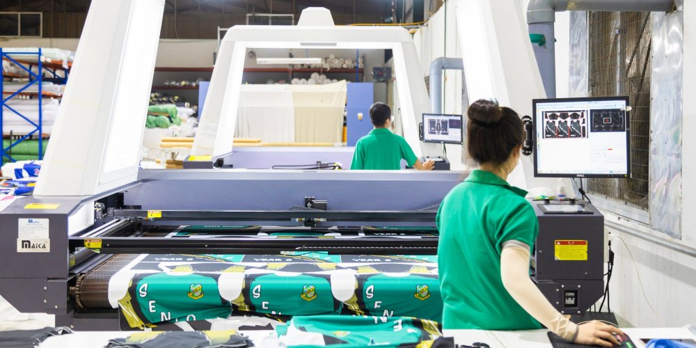 Uniform Link factory printing sublimated senior polo shirts. 